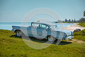 View of grey-blueish vintage retro classic car