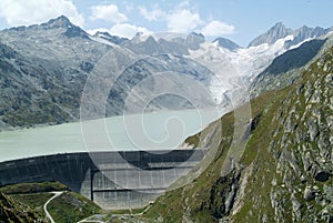 View of the Grimsel lake dam and the Oberaare glacier