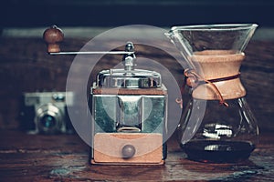 View of ground coffee pouring water on coffee ground with filter