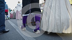 View from the ground of people in a procession in Zaragoza