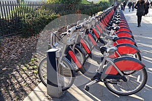 View of a group of rental bikes on a street