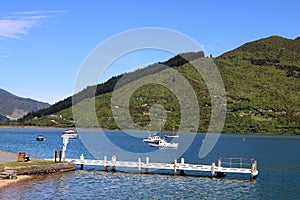 View of Groves Arm Jetty by Queen Charlotte Drive scenic tourist route road, at Okiwa Bay, Queen Charlotte Sound, South Island New