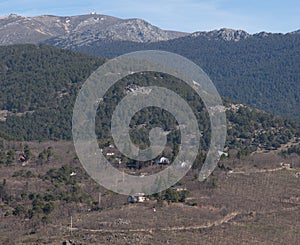 View of Guadarrama National Park mountain range and Camorritos development in Cercedilla photo