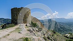 View of Gunibsky fortress. Protective wall and gates of Gunib. Russia, Republic of Dagestan