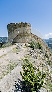 View of Gunibsky fortress. Protective wall and gates of Gunib. Russia, Republic of Dagestan