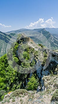 View of Gunibsky fortress. Protective wall and gates of Gunib. Russia, Republic of Dagestan