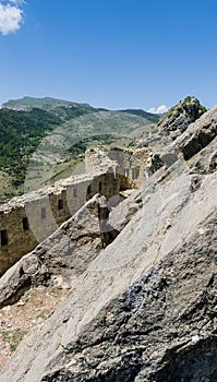 View of Gunibsky fortress. Protective wall and gates of Gunib. Russia, Republic of Dagestan