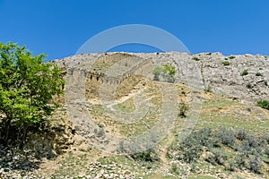 View of Gunibsky fortress. Protective wall and gates of Gunib. Russia, Republic of Dagestan