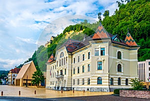 View of the guttenberg castle, old and new parliament building in Vaduz, Liechtenstein....IMAGE