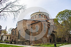 View of Hagia Irene church on the front and dome of Hagia Sophia on the background.