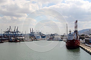 View of Haifa`s Port, Cranes, Boats, Ships and equipment.