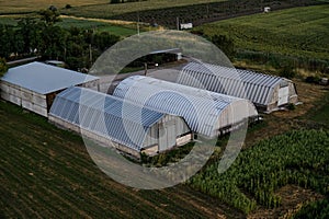 View of the hangars of a rural farm from above