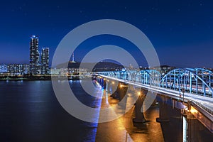 View of hanriver at Dongjak bridge and N Seoul tower at night in Seoul south korea
