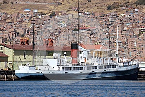 Historic steamship docked on Lake Titicaca in Puno, Peru photo
