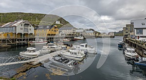 View on the harbor of remote fishing village in the VesterÃ¥len archipelago in the north of Norway.