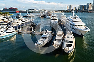 View of the harbour. Luxury yachts docked in sea port. Marine parking of modern motor boats and blue water. Tranquility