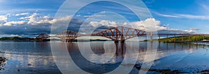 A view from the harbour at Queensferry towards the Railway Bridge over the Firth of Forth, Scotland