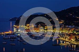 View of the harbour and the village by night, Santa Margherita Ligure, Genoa, Italy.