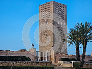 view of Hassan tower from the street , important historical and tourist complex in Rabat, Morocco