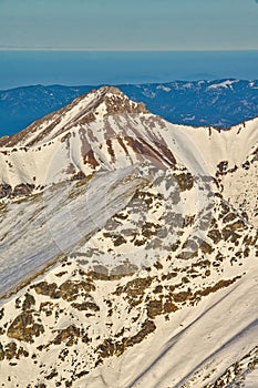 View of Havran mountain from Rysy peak during winter photo