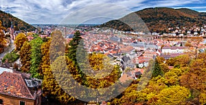 View on Heidelberg in autumn with red foliage including Carl The