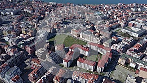 View from a height of the city of Pomorie with many cars, houses and hotels