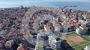 View from a height of the city of Pomorie with many cars, houses and hotels