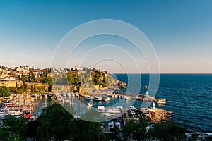 View from a height of the harbor near the old town of Kaleichi in the Turkish city of Antalya. photo