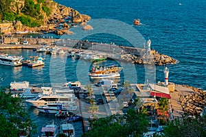 View from a height of the harbor near the old town of Kaleichi in the Turkish city of Antalya. photo