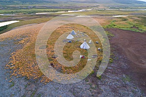 View from height on a settlement of nomads reindeer breeders in the valley of the Longotjyogan River aerial photograph. Yamal