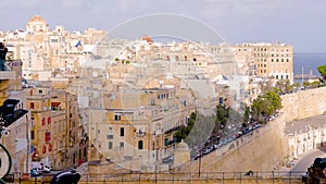 View from the heights of the morning city, yellow buildings, silence, dawn, quiet life, birds in the sky, tourism, Malta