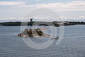 View of the Helsinki harbour, marina bay in the background, and Sveaborg island, view from top of a cruise ship