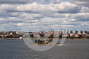 View of the Helsinki harbour, marina bay in the background, and Sveaborg island, view from top of a cruise ship