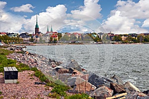 View of helsinki from a rocky shore