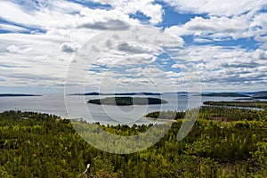 View from the High Coast area i Vasternorrland Sweden with a island in center photo