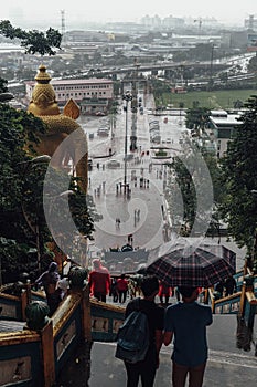 View from high entrance with rain of Batu Caves near Kuala Lumpur, Malaysia.