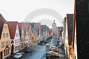 View from a high point to a beautiful street with traditional German houses in Rothenburg ob der Tauber in Germany