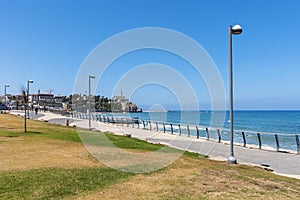 View from a high point of view; the azure blue sea with the Tel Aviv skyline, with its many modern buildings on the boulevard and