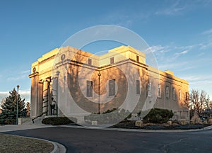 View of the Highlands Masonic Temple in Denver, Colorado, at sunset.