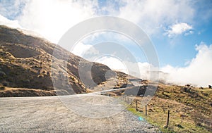 View of highway road on the famous Crown Range Road, the highest paved highway in Cardrona valley, Otago region of New Zealand.