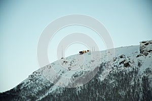 View on hill with cable car station in Tromso Norway