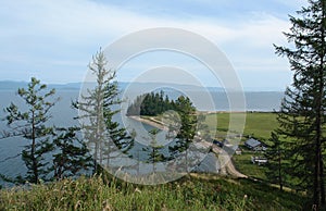 View from the hill on the Katun village near the Chivyrkuisky Bay of Lake Baikal, Svyatoy Nos  `Holy Nose` Peninsula photo