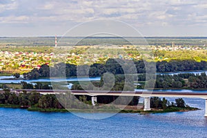 View of hills and steppe and a modern bridge over upper river Don in Russia