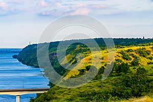 View of hills and steppe and a modern bridge over upper river Don in Russia