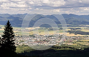 View from the hills to the city and nature during sunny day.