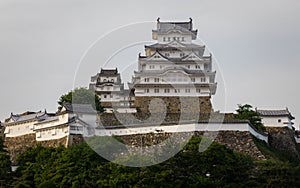 View on Himeji Castle on a clear, sunny day with many green around. Himeji, Hyogo, Japan, Asia