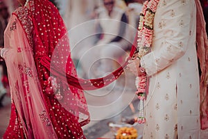 View of the Hindu couple& x27;s hands during the wedding ceremony - religious items and rituals