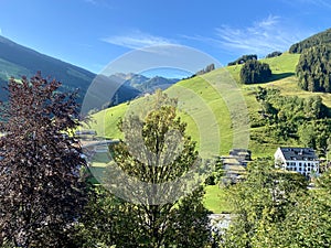 View of Hinterglemm hotels and skiing lift in the mountains of the Saalbach-Hinterglemm skiing region in Austria on a