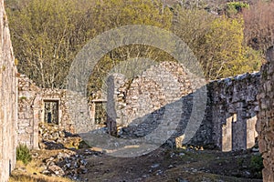 View of historic building in ruins, inside convent of St. Joao of Tarouca, detail of ruined wall with spans of symmetrical windows