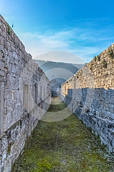 View of historic building in ruins, inside convent of St. Joao of Tarouca, detail of ruined walls corridor with spans of